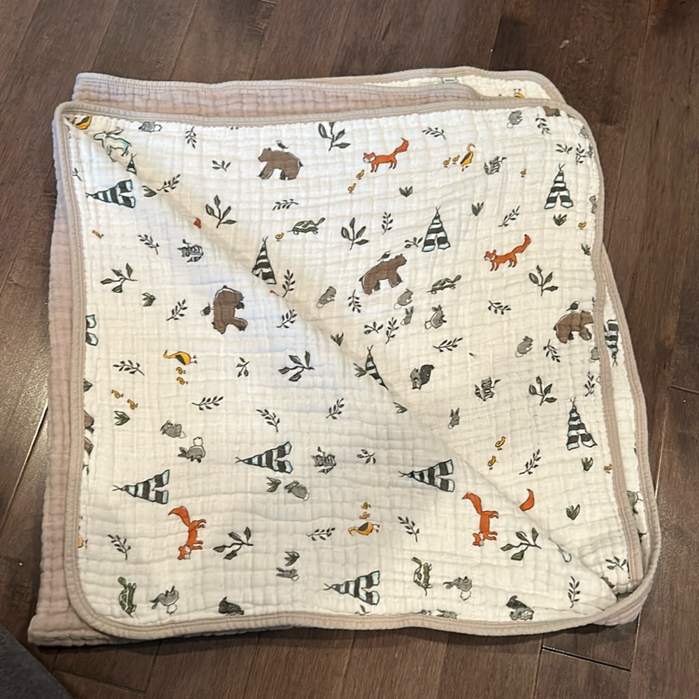 Deluxe muslin quilt from Little Unicorn. Forrest friends pattern